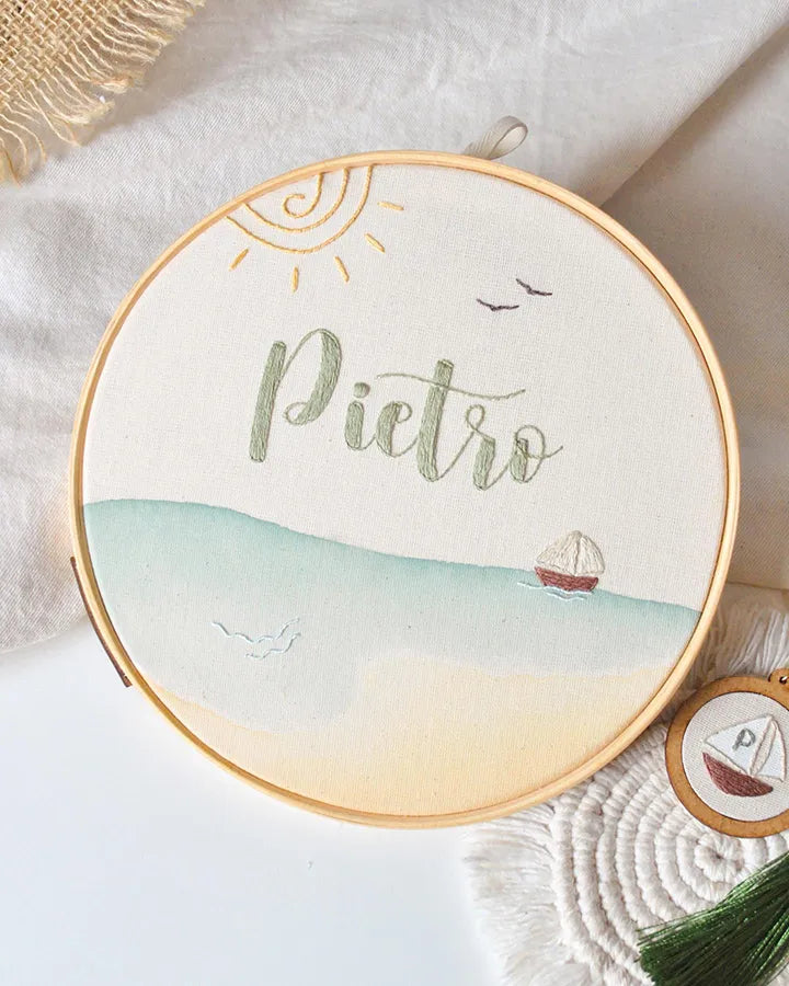 Decorative hoop with name and sailboat design