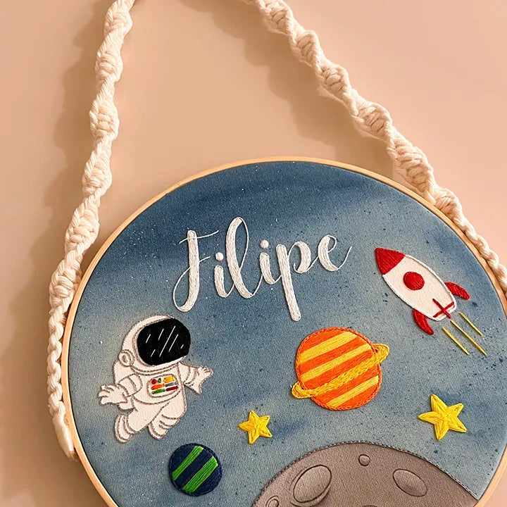Decorative hoop with space-themed decorations