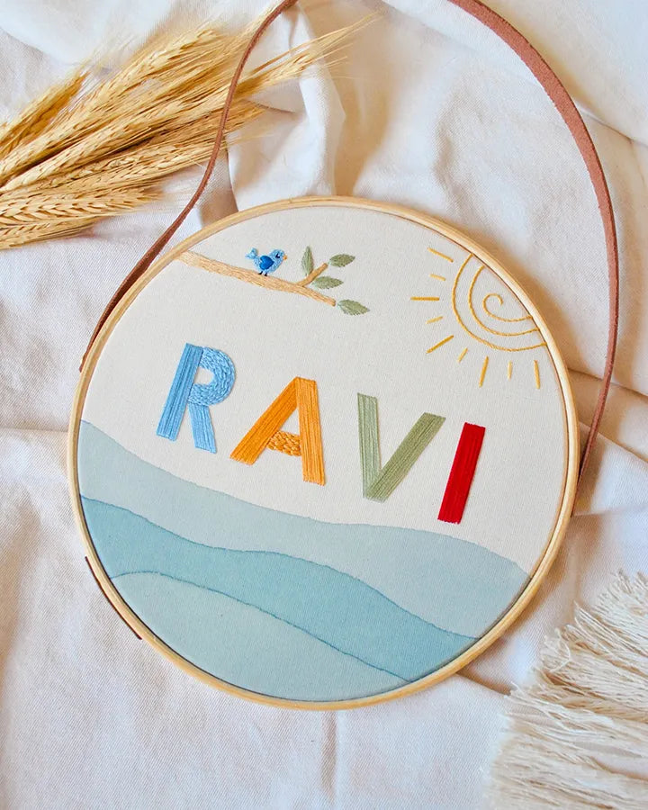 Embroidery hoop with colorful name embroidery