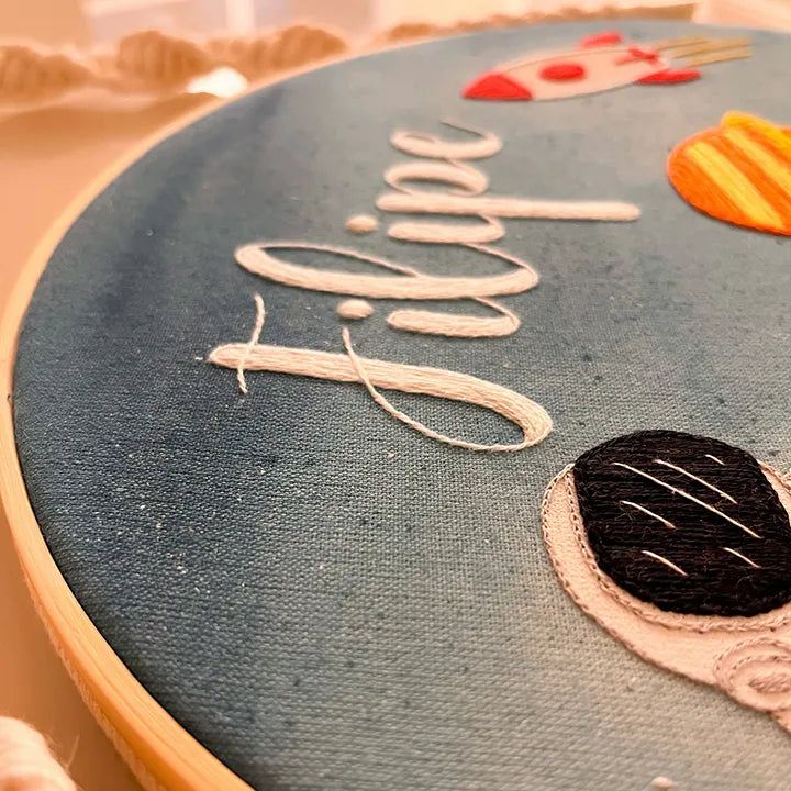 Embroidery hoop with embroidered name