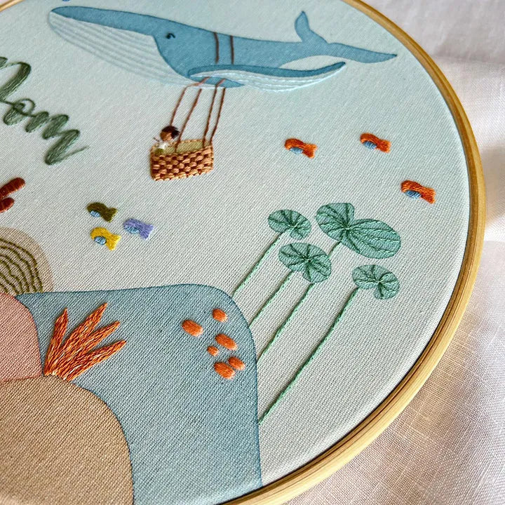 Embroidery hoop with whale