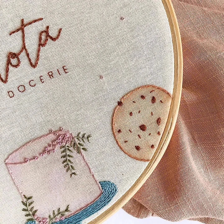 Kitchen wall clocks with pink cake design and delicate flower embroidery