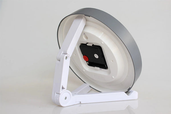 clock with white adjustable clock stand