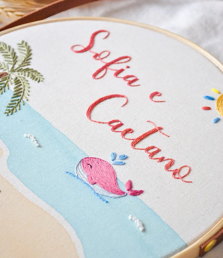 decorative embroidery hoop with a pink whale